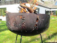 fire-bowl with 2 various tiger-motives, hunters and grass.