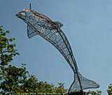 Dolphin welded sheet steel garden Sculpture.