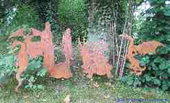 Garden stakes rusty metal sheet mythological creatures.