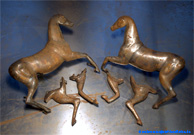 Steel sculpture horse shape.