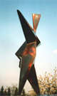 Steel sculpture standing woman.