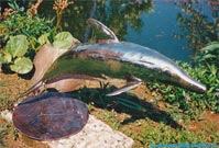 Swinging sculpture dolphin