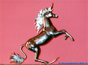 Steel sculpture swinging unicorn